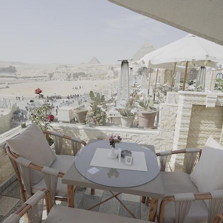 Queen Cleopatra Pyramids Hotel ไคโร ภายนอก รูปภาพ