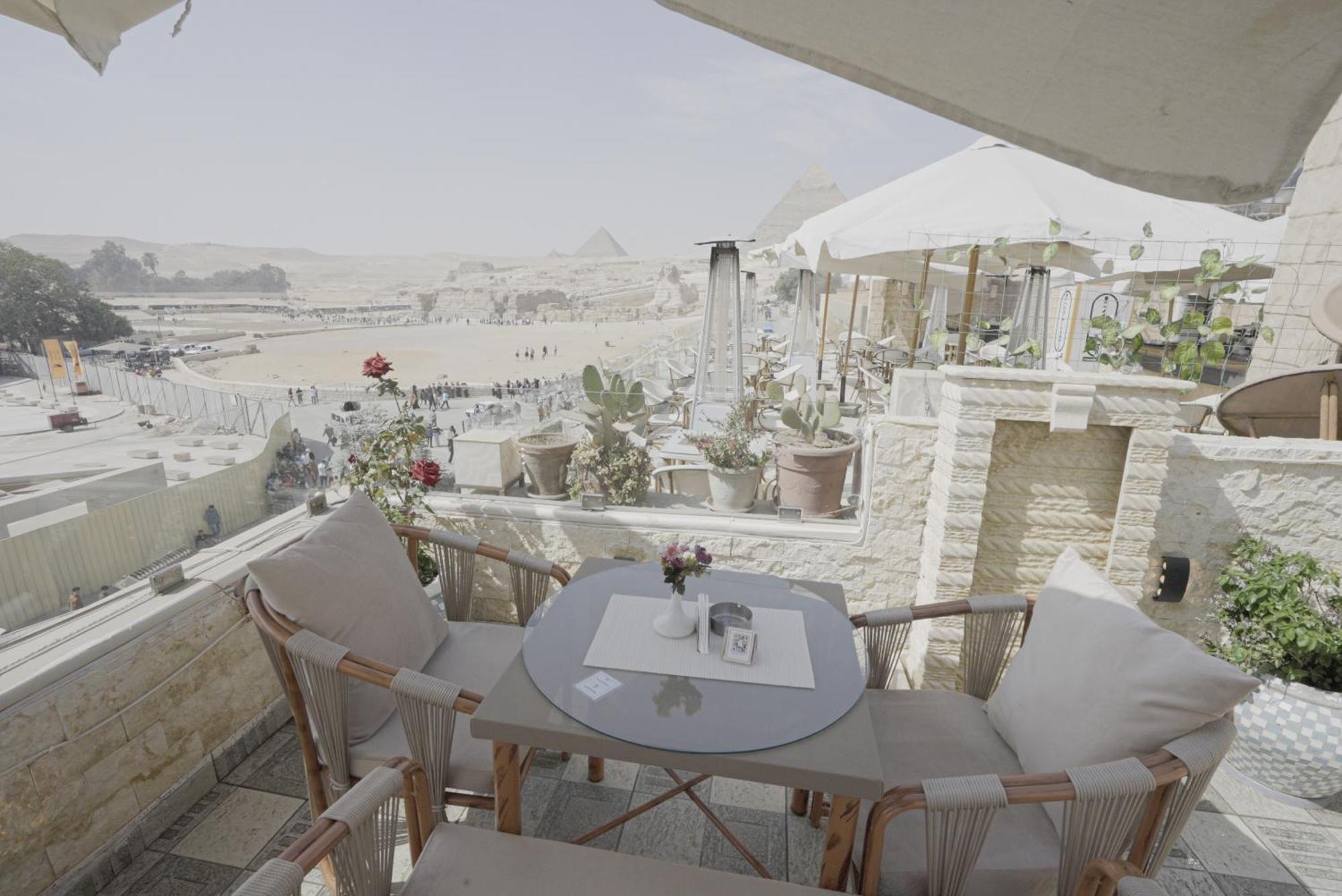 Queen Cleopatra Pyramids Hotel ไคโร ภายนอก รูปภาพ