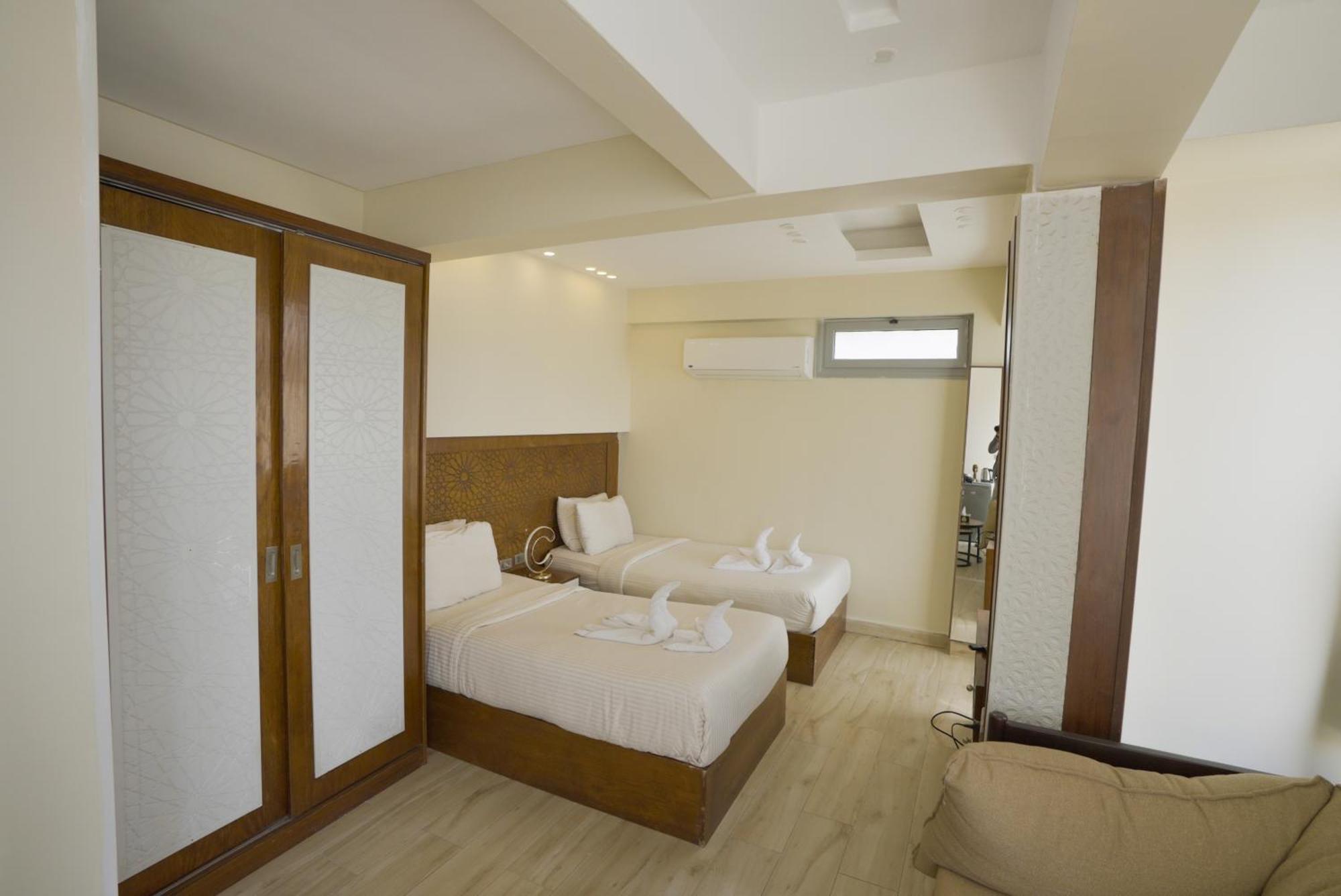 Queen Cleopatra Pyramids Hotel ไคโร ภายนอก รูปภาพ