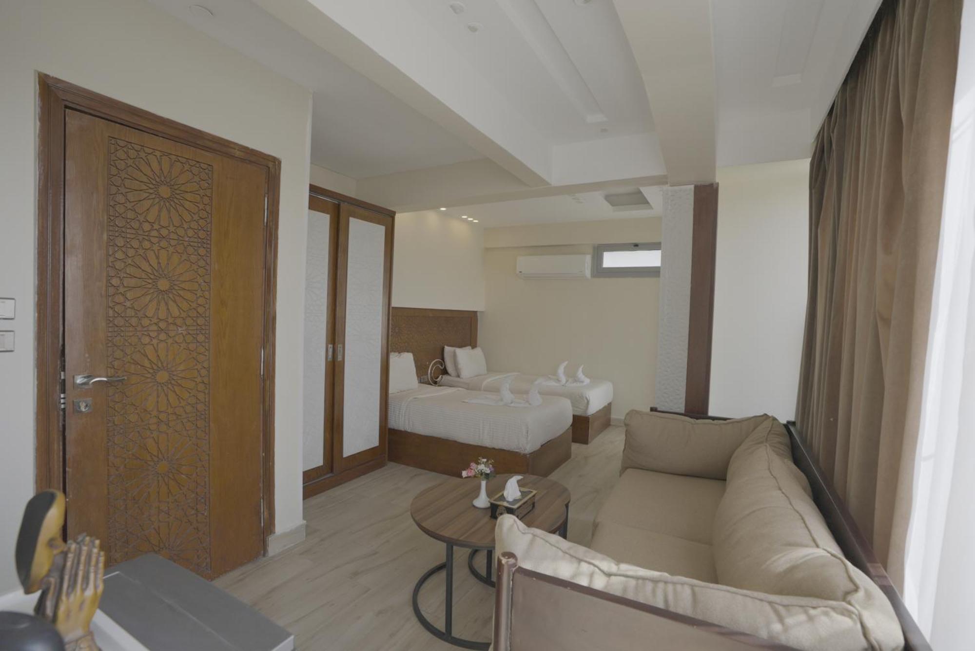 Queen Cleopatra Pyramids Hotel ไคโร ภายนอก รูปภาพ